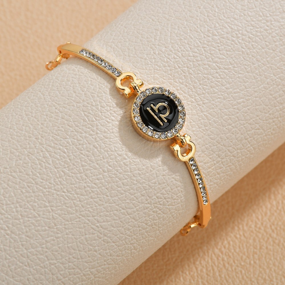 Wholesale Drip Oil 12 Constellation Gold Rhinestone Alloy Bracelet